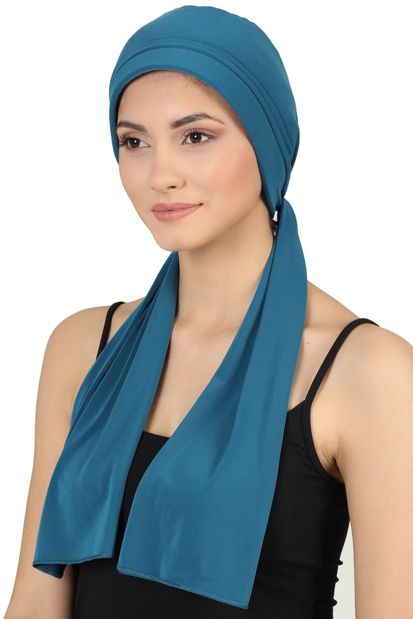 Vielseitige Kopfbedeckung mit langen Schwänzen – Blaugrün
